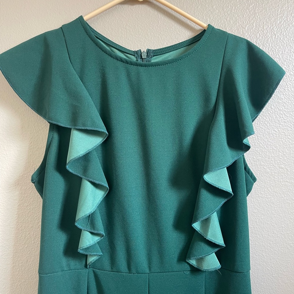 Green jumpsuit, warn once for the holidays.